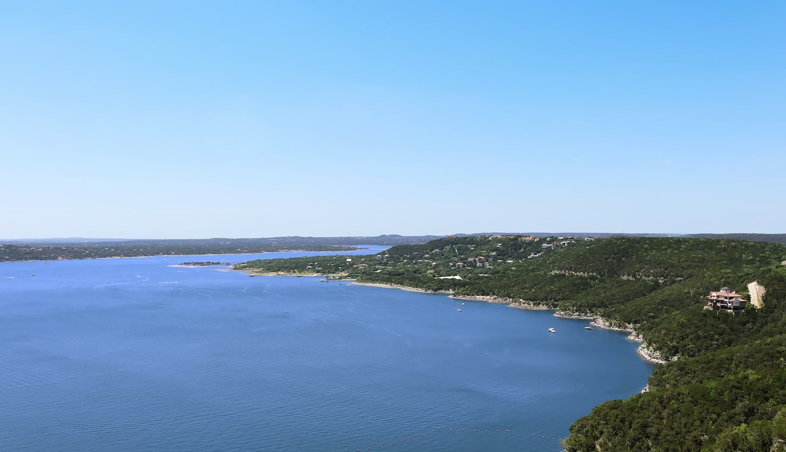Party boats on Lake Travis at Devils Cove - Austin TX